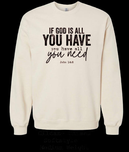 Beige sweatshirt with motivational quote on a black background